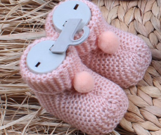 Scarpine in maglia con pompon per neonato grigio